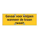 Gevaar voor knijpen wanneer de kraan zwaait