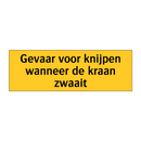 Gevaar voor knijpen wanneer de kraan zwaait