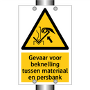 Gevaar voor beknelling tussen materiaal en persbank