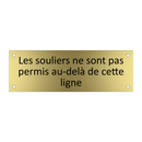 Les souliers ne sont pas permis au-delà de cette ligne