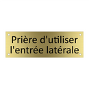 Prière d'utiliser l'entrée latérale
