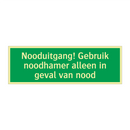 Nooduitgang! Gebruik noodhamer alleen in geval van nood