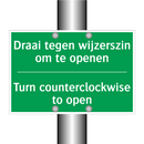 Draai tegen wijzerszin om te openen /.../ - Turn counterclockwise to /.../