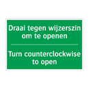 Draai tegen wijzerszin om te openen /.../ - Turn counterclockwise to /.../
