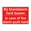 Bij brandalarm hard duwen - In case of fire alarm push hard