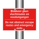 Blokkeer geen vluchtroutes en nooduitgangen /.../ - Do not obstruct escape routes and emergency /.../