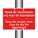 Houd de vluchtroute vrij voor de brandweer /.../ - Keep the escape route clear for the fire /.../