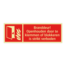 Branddeur! Openhouden door te klemmen of blokkeren is strikt verboden