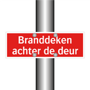 Branddeken achter de deur