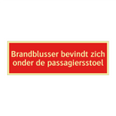 Brandblusser bevindt zich onder de passagiersstoel