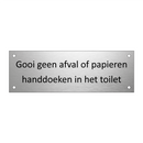 Gooi geen afval of papieren handdoeken in het toilet