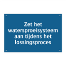 Zet het watersproeisysteem aan tijdens het lossingsproces