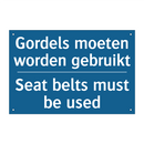 Gordels moeten worden gebruikt - Seat belts must be used