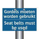 Gordels moeten worden gebruikt - Seat belts must be used