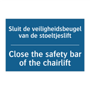 Sluit de veiligheidsbeugel van /.../ - Close the safety bar of the chairlift /.../