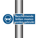 Beschermende brillen moeten worden gebruikt & Beschermende brillen moeten worden gebruikt