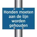 Honden moeten aan de lijn worden gehouden & Honden moeten aan de lijn worden gehouden