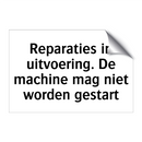 Reparaties in uitvoering. De machine mag niet worden gestart