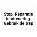 Stop. Reparatie in uitvoering. Gebruik de trap