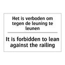 Het is verboden om tegen de leuning /.../ - It is forbidden to lean against /.../