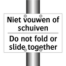 Niet vouwen of schuiven - Do not fold or slide together