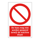 De hoes mag niet worden geopend terwijl de machine draait