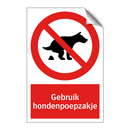 Gebruik hondenpoepzakje