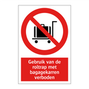Gebruik van de roltrap met bagagekarren verboden