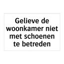 Gelieve de woonkamer niet met schoenen te betreden