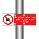 Gebruik van de roltrap met bagagekarren verboden