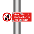 Geen afval of handdoeken in de toiletpot