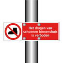 Het dragen van schoenen binnenshuis is verboden
