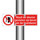 Houd de deuren gesloten op bevel van de brandweer