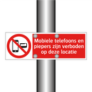 Mobiele telefoons en piepers zijn verboden op deze locatie