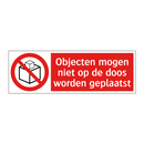 Objecten mogen niet op de doos worden geplaatst