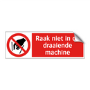 Raak niet in de draaiende machine