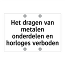 Het dragen van metalen onderdelen en horloges verboden
