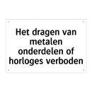 Het dragen van metalen onderdelen of horloges verboden
