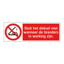 Sluit het deksel niet wanneer de branders in werking zijn.