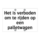 Het is verboden om te rijden op een palletwagen