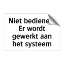 Niet bedienen. Er wordt gewerkt aan het systeem