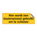 Hier wordt een boutenpistool gebruikt om te schieten