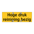 Hoge druk reiniging bezig