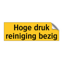 Hoge druk reiniging bezig