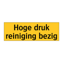 Hoge druk reiniging bezig