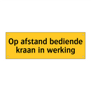 Op afstand bediende kraan in werking