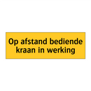 Op afstand bediende kraan in werking