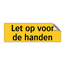 Let op voor de handen