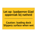 Let op: laadperron Glad oppervlak bij natheid - Caution: loading dock Slippery surface when wet