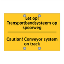 Let op! Transportbandsysteem op spoorweg - Caution! Conveyor system on track